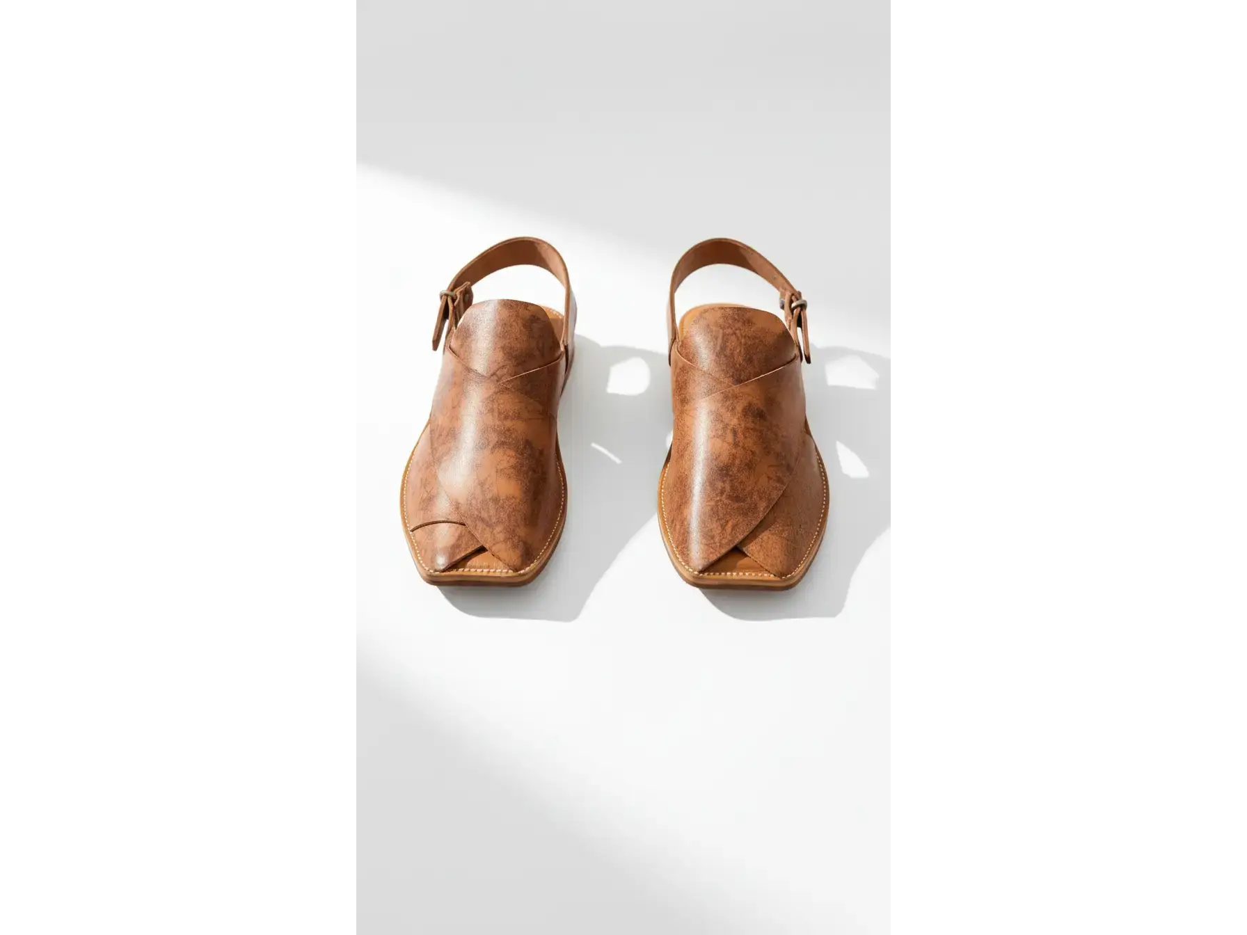 Vintage Tan Handcrafted Leather Chappals with a distressed finish and square toe on a white background.